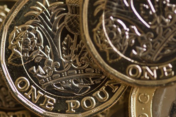 Close up of the new UK pound coin released into circulation 30 Mar 2017.