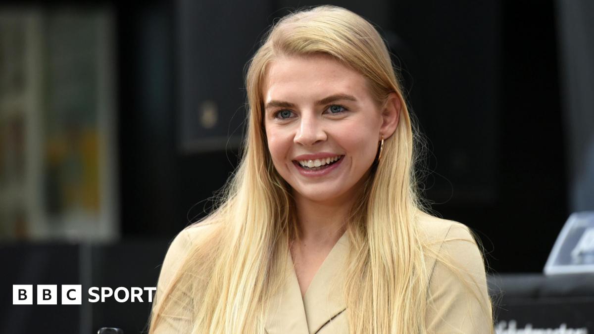Ebonie Jones walks back to her corner at the end of a round