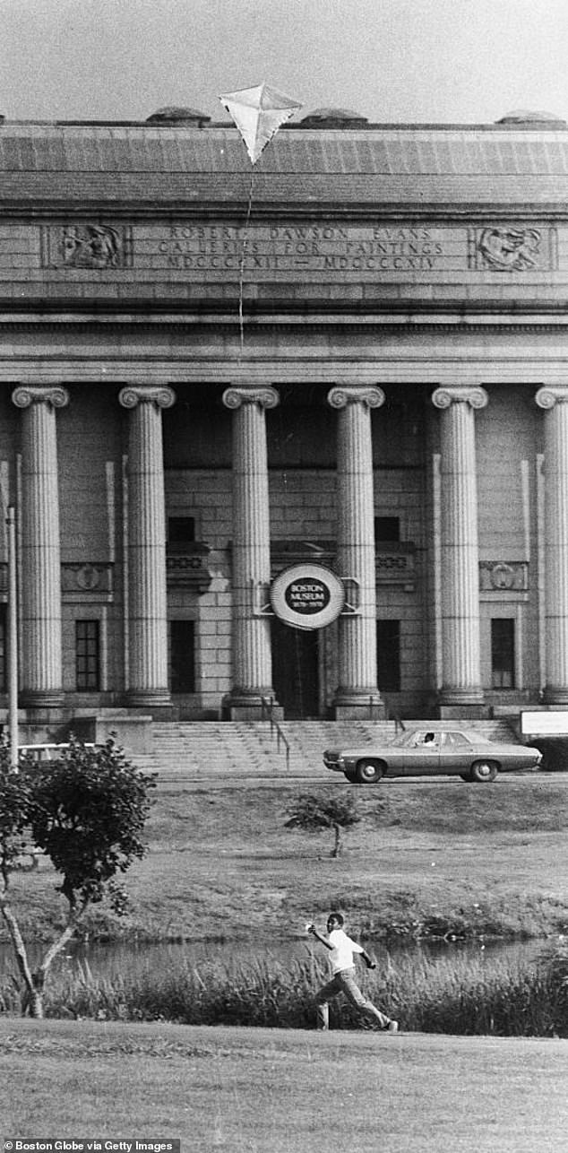 A boy flies a kite in the Fens near the Museum of Fine Arts, Boston in 1970