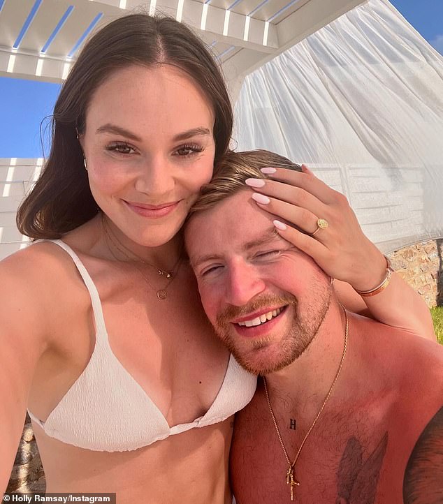 Holly Ramsay and fiancé Adam Peaty are caught in a bitter family feud after the Olympian banned his mother from their wedding