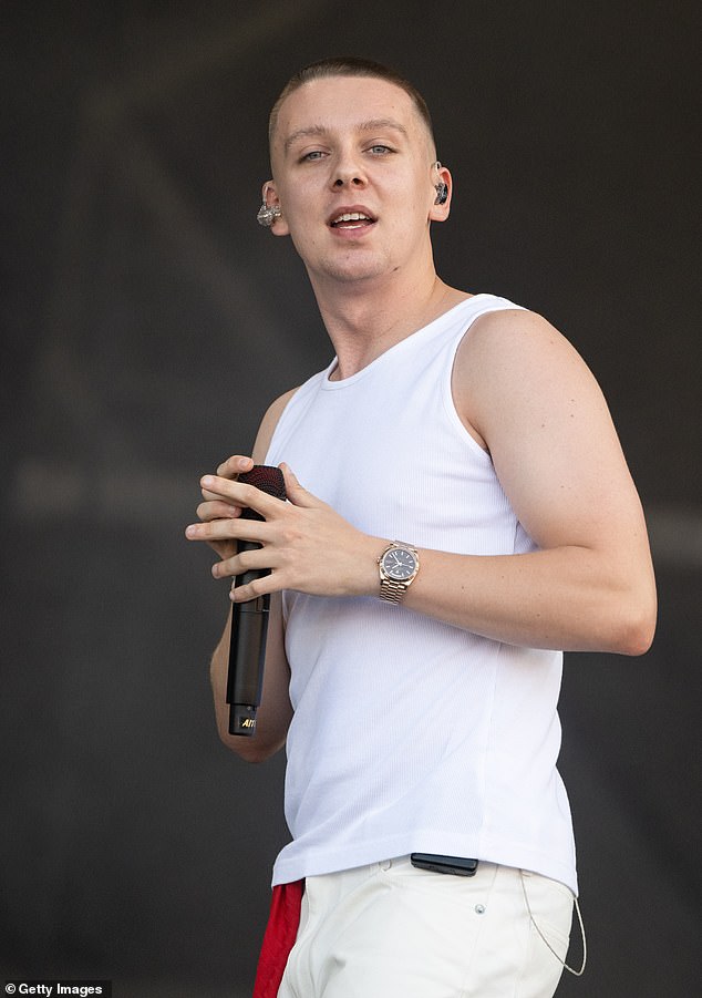 BRIT-winning rapper Aitch, who boasts 20 top ten singles in the UK, reportedly sits on a net worth of £3.5million, thanks to his musical deals (pictured at Glastonbury in 2023)