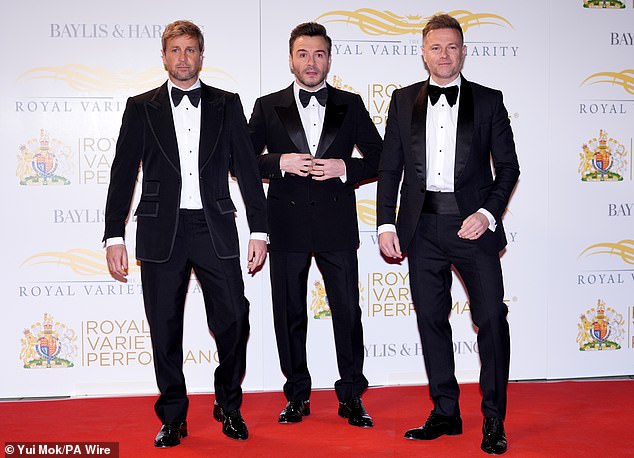 Kian Egan, Shane Filan and Nicky Byrne of Westlife looked dapper in their matching black suits and bow ties
