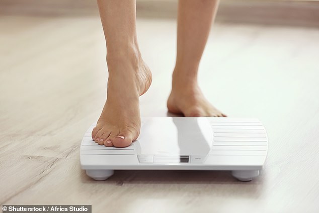 After four weeks on any weight loss drugs, you should weigh in and check your progress (stock image)