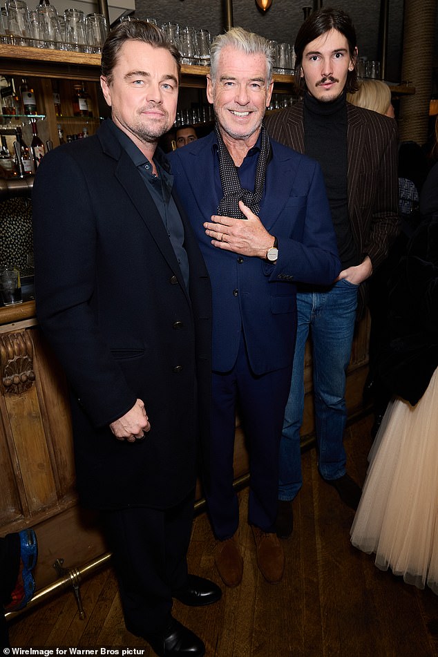 The pair were also joined at the event by Pierce Brosnan and his son Dylan as the threesome smiled together