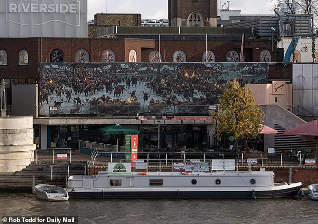 The huge artwork spanned several restaurants on Riverside Walk in Kingston, which is owned by a private investment firm