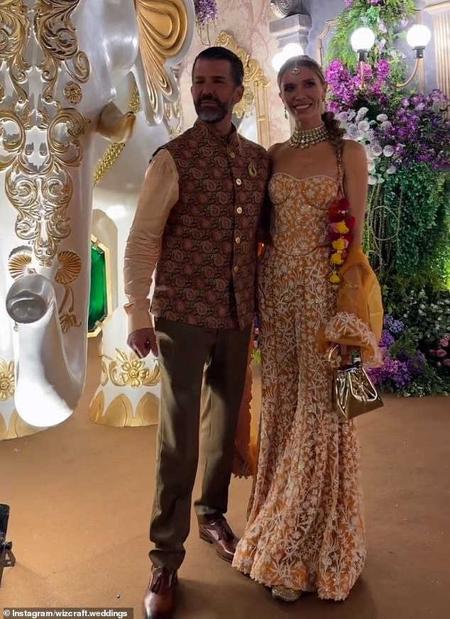 Trump Jr and Bettina are pictured here wearing traditional Indian dres