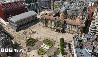 Family having a moment together messing about while winter sea swimming