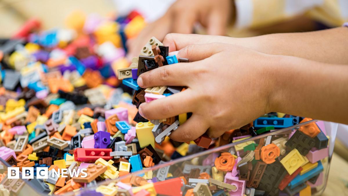 Children learn to assemble LEGO bricks during the Master Model Builder Show at LEGO Festival Media Day at LEGOLAND California on May 03, 2025 in Carlsbad, California