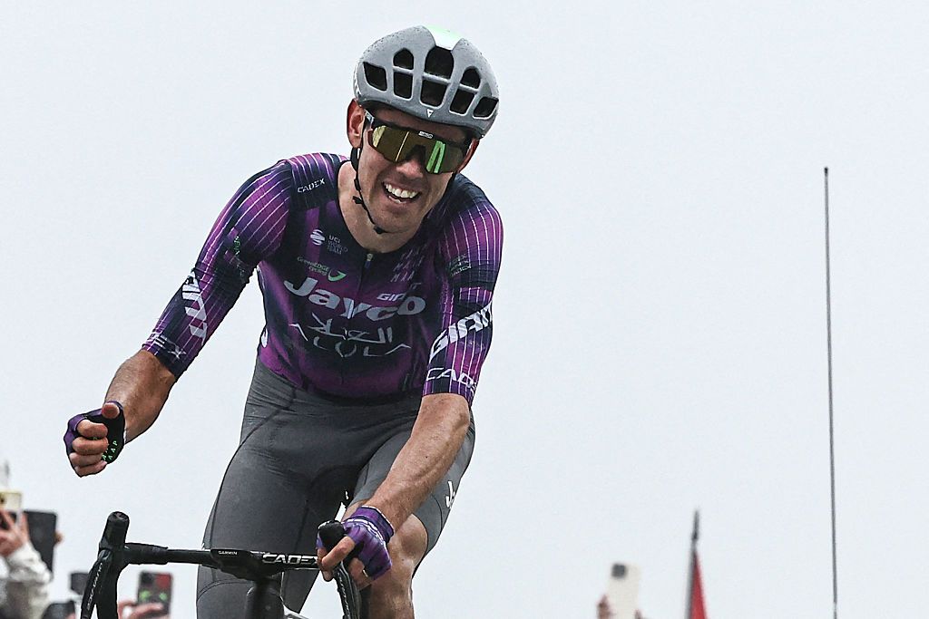 TOPSHOT - Team Jayco AlUla team's Australian rider Ben O'Connor cycles to the finish line to win the 18th stage of the 112th edition of the Tour de France cycling race, 171.5 km between Vif and Courchevel Col de la Loze, in the Alps, southeastern France, on July 24, 2025. (Photo by Anne-Christine POUJOULAT / AFP) (Photo by ANNE-CHRISTINE POUJOULAT/AFP via Getty Images)