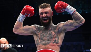 Lewis Crocker poses with his belt after beating Paddy Donovan
