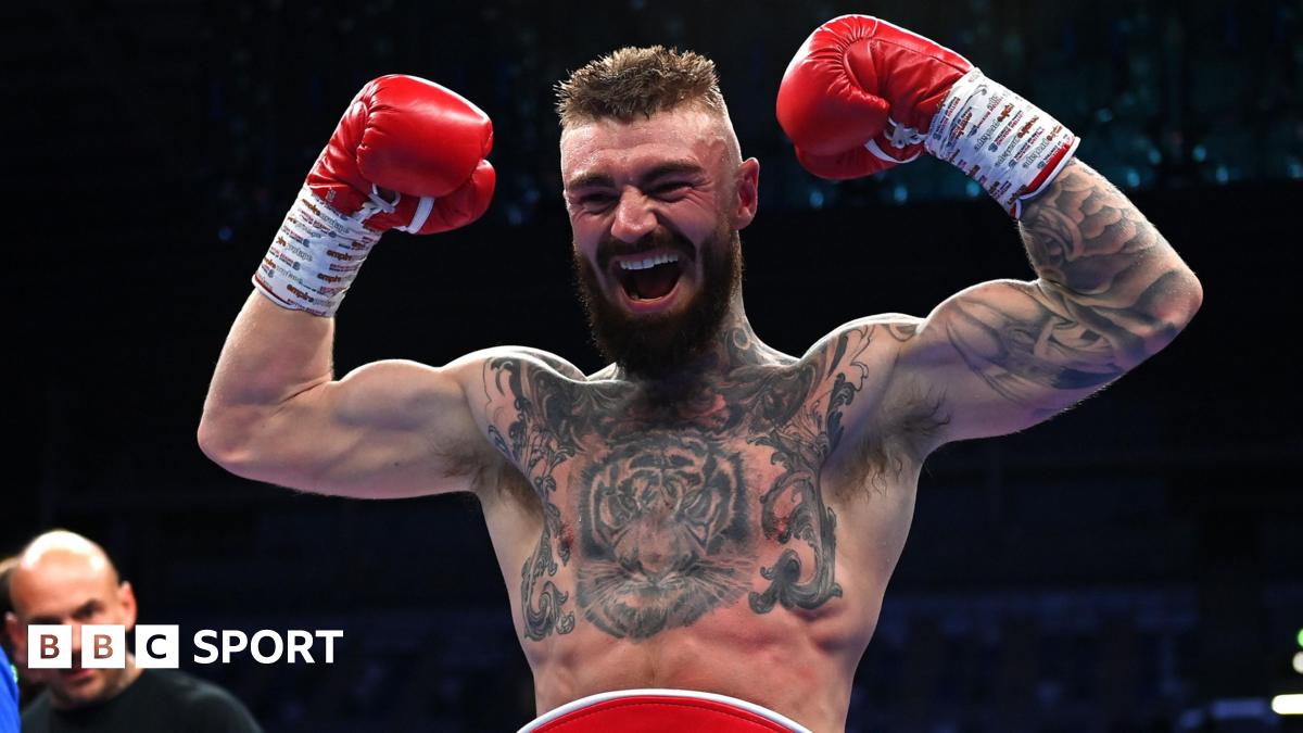 Lewis Crocker poses with his belt after beating Paddy Donovan