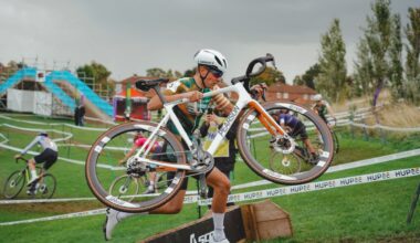Man runs with bike carried