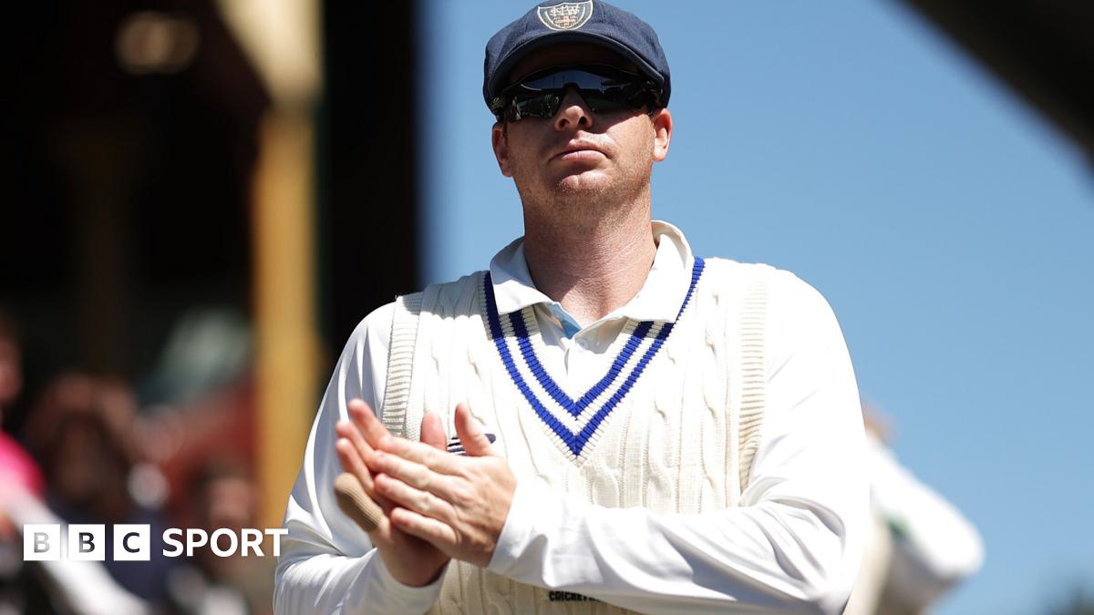 Steve Smith looks on