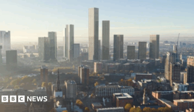An artist's impression of the tower, standing tall amid a general shot of the Greater Manchester skyline