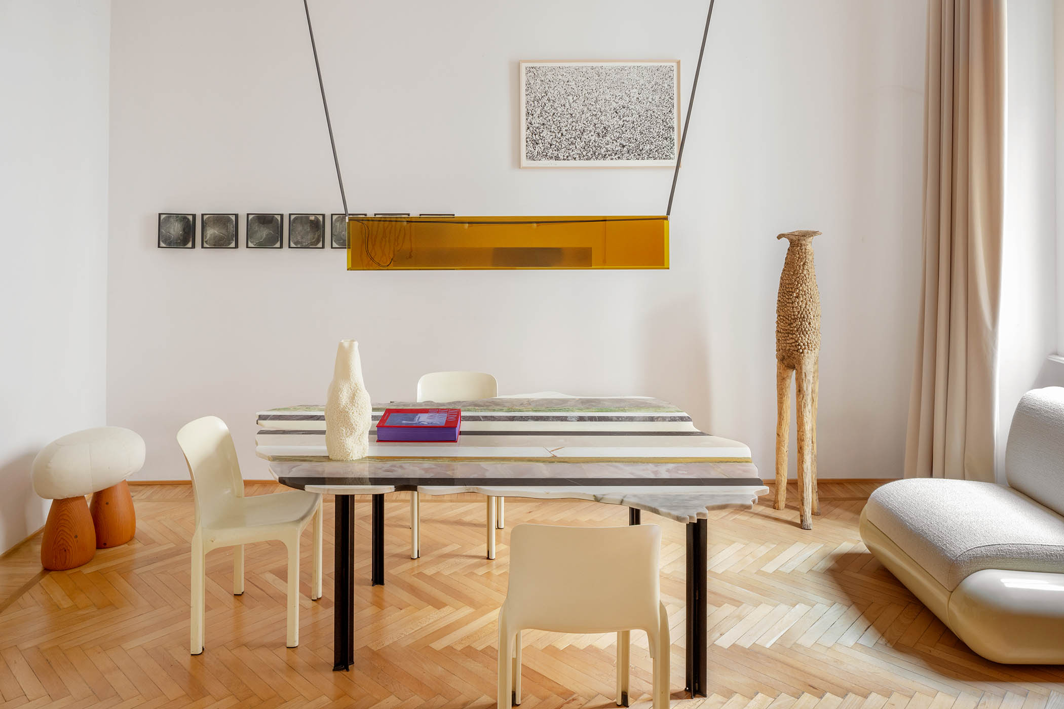 Original parquet in the dining-room, and a marble table in the shape of the island of Stromboli