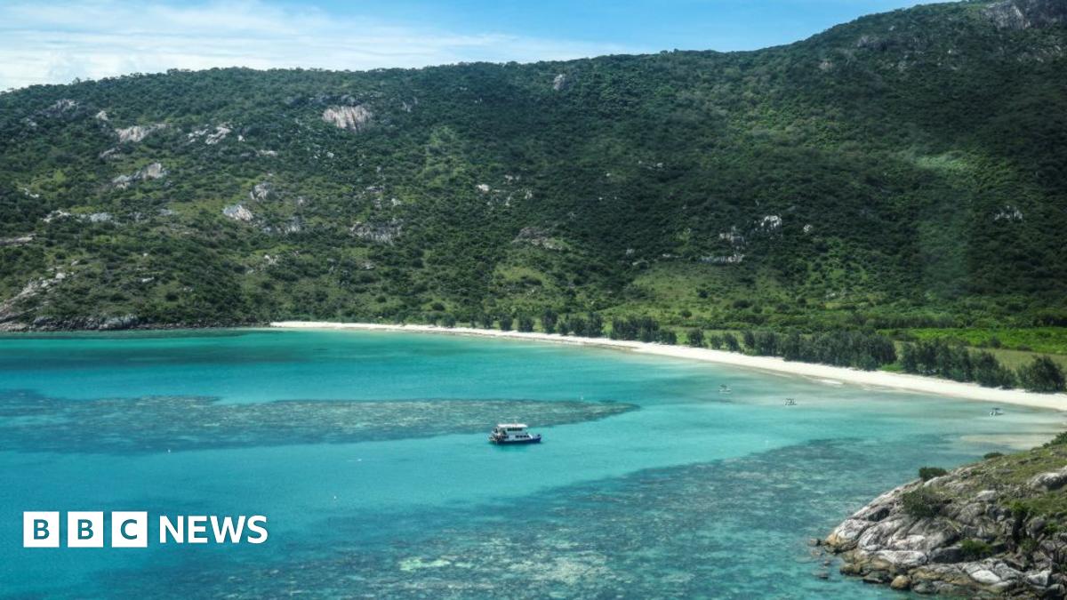 An aerial photo taken on April 4, 2024, shows a boat anchored near coral around Lizard Island on the Great Barrier Reef.