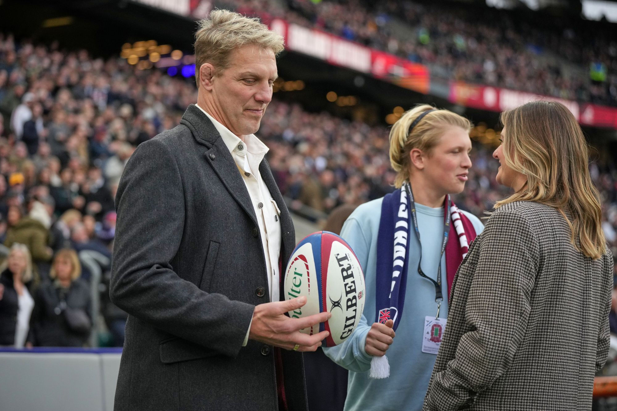 Former England international Lewis Moody stands on the side of the pitch