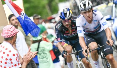Soudal Quick-Step team's Belgian rider Remco Evenepoel wearing the best young rider's white jersey and Red Bull - BORA - hansgrohe team's Slovenian rider Primoz Roglic cycle in a pursuing group in the final kilometers of the 11th stage of the 111th edition of the Tour de France cycling race, 211 km between &Eacute;vaux-les-Bains and Le Lioran, on July 10, 2024. (Photo by Marco BERTORELLO / AFP) (Photo by MARCO BERTORELLO/AFP via Getty Images)