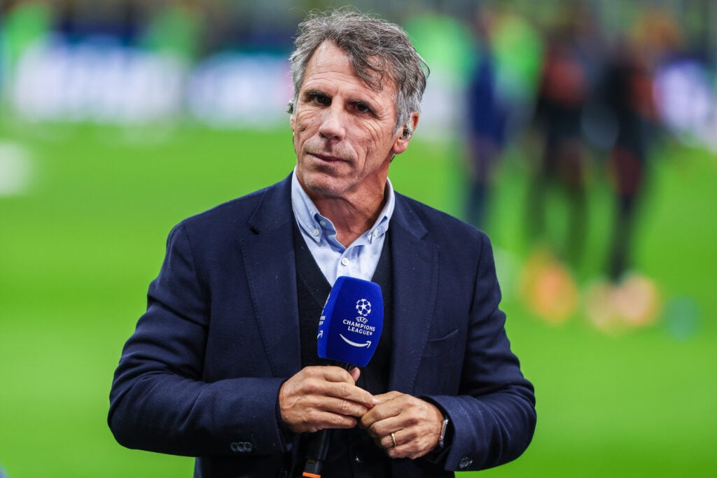Chelsea legend Gianfranco Zola holding microphone