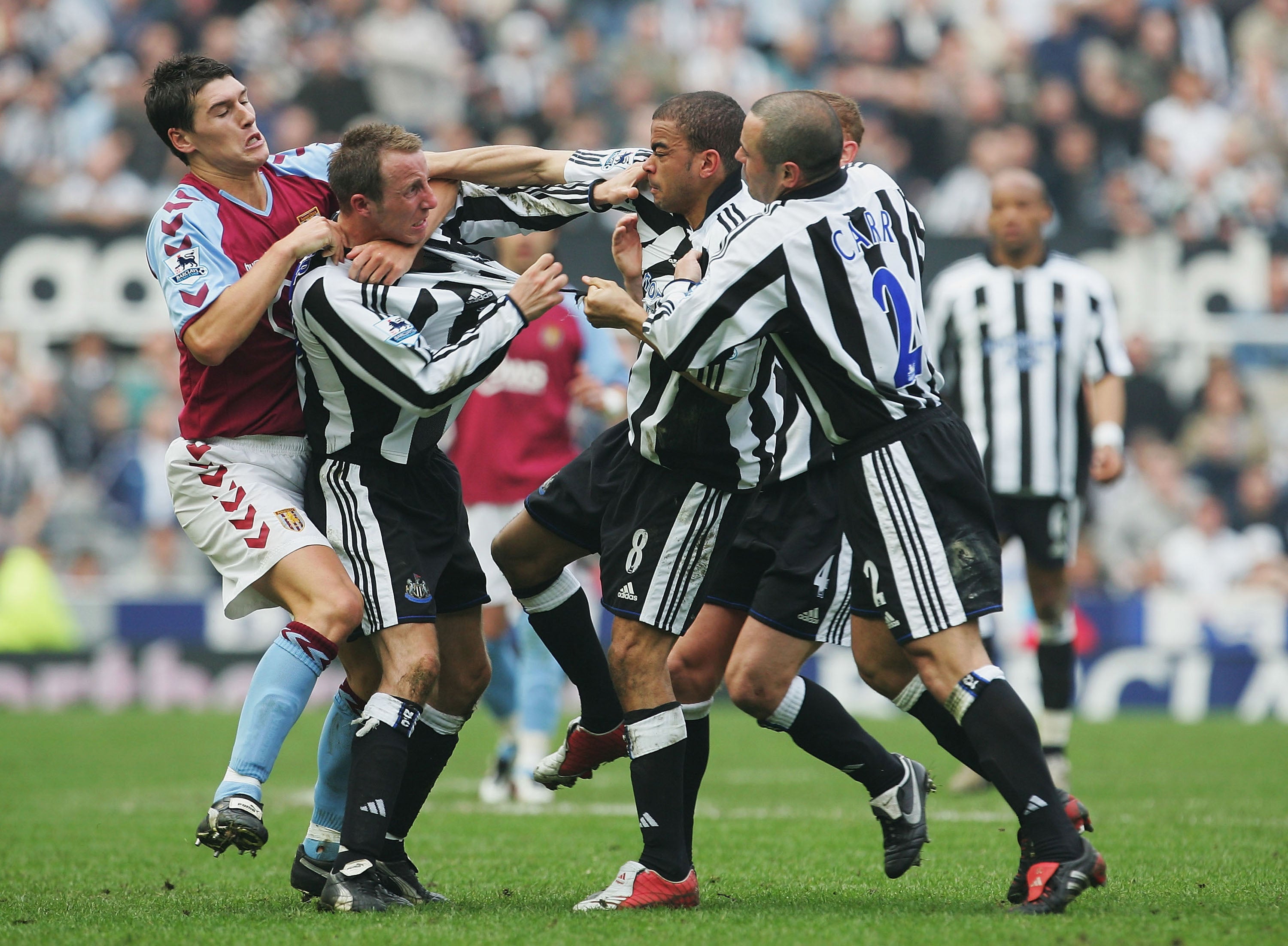 Lee Bowyer and Kieron Dyer of Newcastle come to blows in 2005