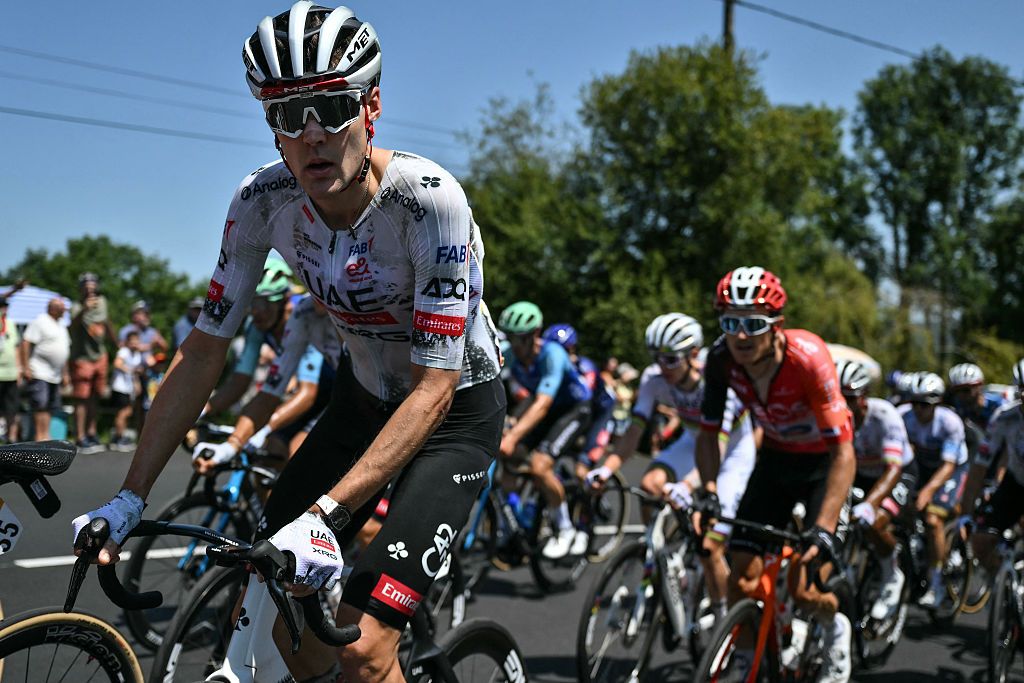 UAE Team Emirate - XRG team's French rider Pavel Sivakov cycles in the ascent of Cote de Labatmale during the 12th stage of the 112th edition of the Tour de France cycling race, 180.6 km between Auch and Hautacam, in the Pyrenees mountains of southwestern France, on July 17, 2025. (Photo by Marco BERTORELLO / AFP)