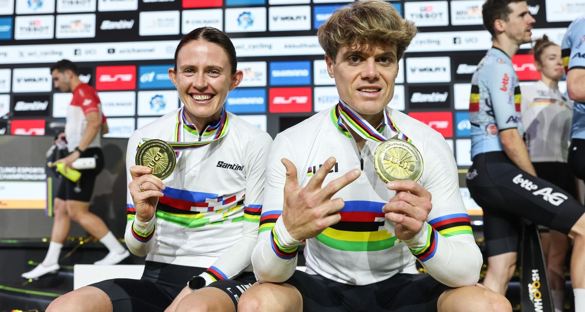 winners of the 2025 UCI Cycling Esports World Championships: Mary Kate McCarthy and Jason Osborne