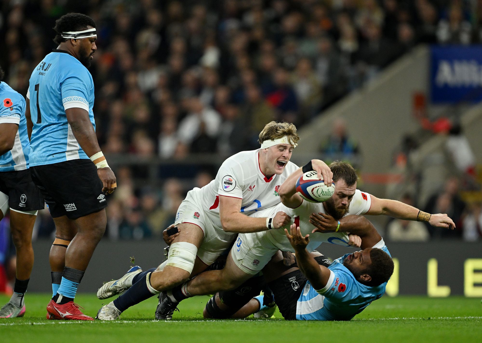 Luke Cowan-Dickie scores with the support of teammate Alex Coles