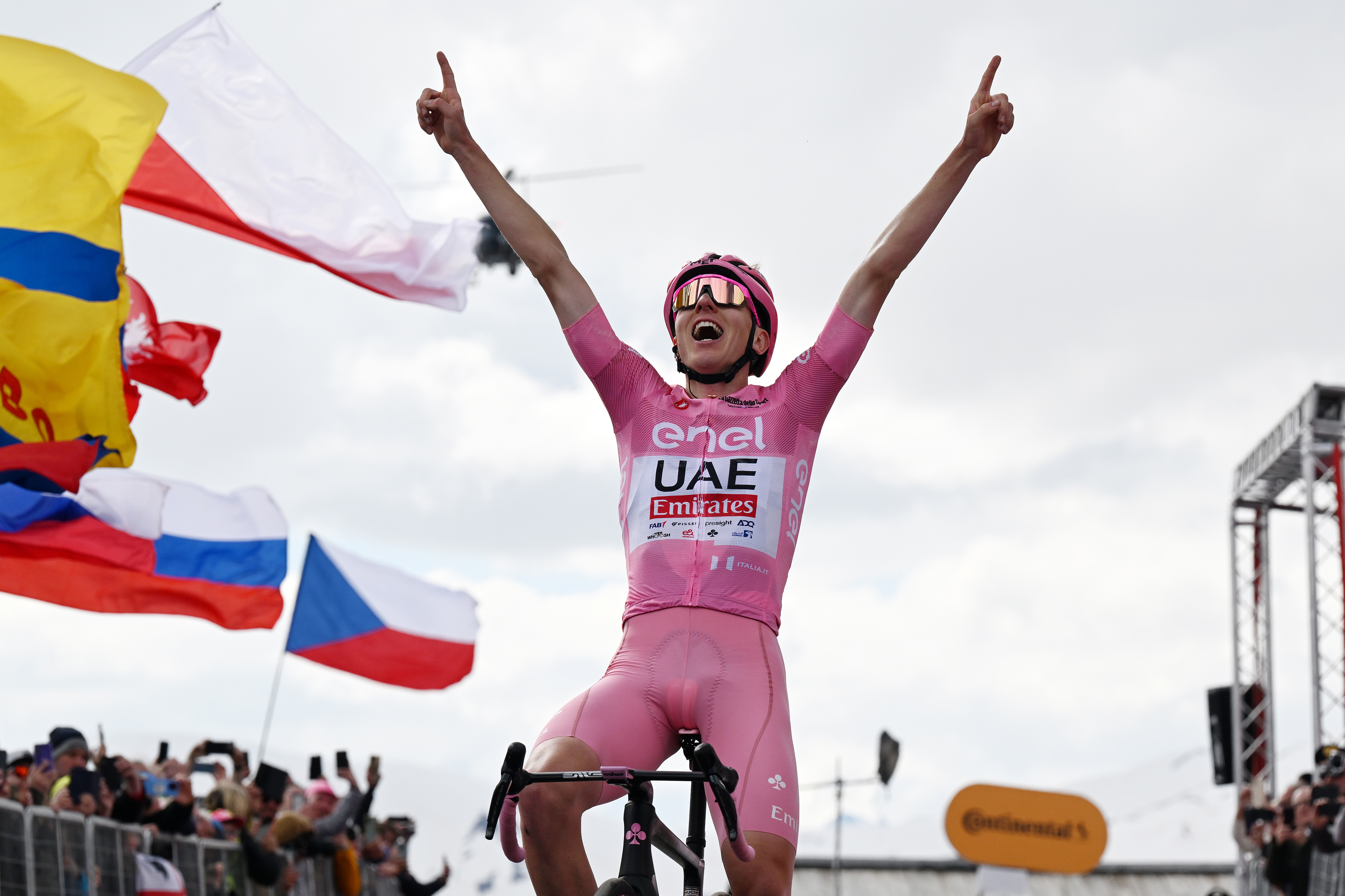 LIVIGNO - MOTTOLINO, ITALY - MAY 19: Tadej Pogacar of Slovenia and UAE Team Emirates - Pink Leader Jersey celebrates at finish line as stage winner during the 107th Giro d&amp;apos;Italia 2024, Stage 15 a 222km stage from Manerba del Garda to Livigno - Mottolino 2387m / #UCIWT / on May 19, 2024 in Livigno - Mottolino, Italy. (Photo by Tim de Waele/Getty Images)