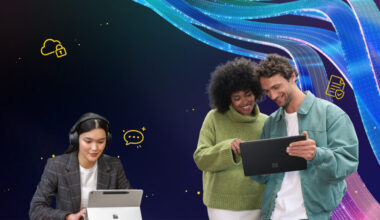 An image of two people sharing a tablet and another working to their left, against a background of dark blue with wavy lighter blue lines in the right corner.