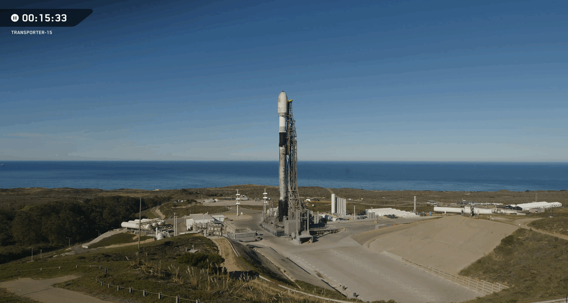 SpaceX scrubs launch of 140 satellites atop used Falcon 9 rocket from California coast