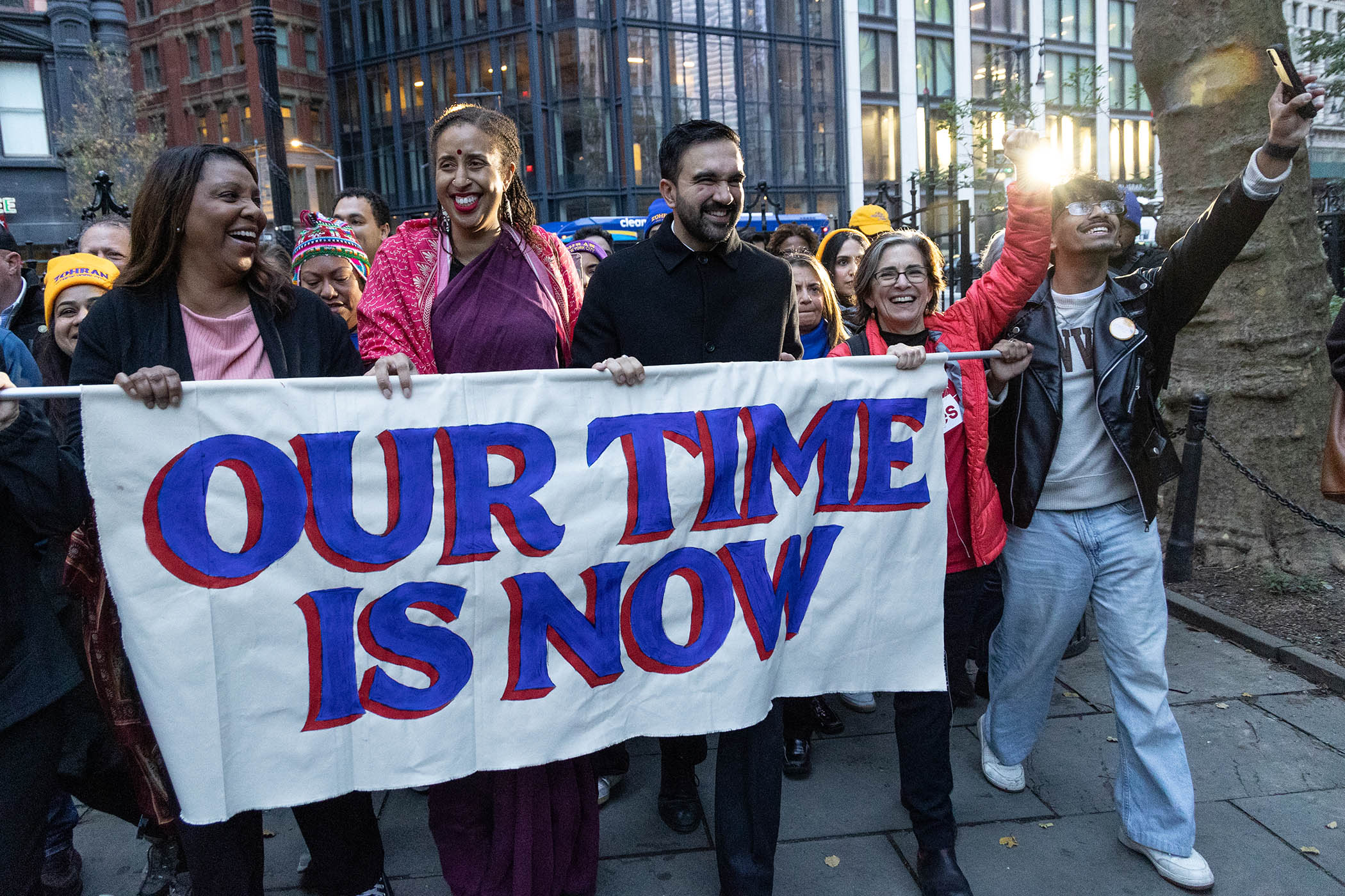 Zohran Mamdani arrives with his supporters to speak at a dawn ralley in front of City hall in Manhattan