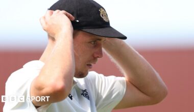 Cameron Green adjusts his cap in the field