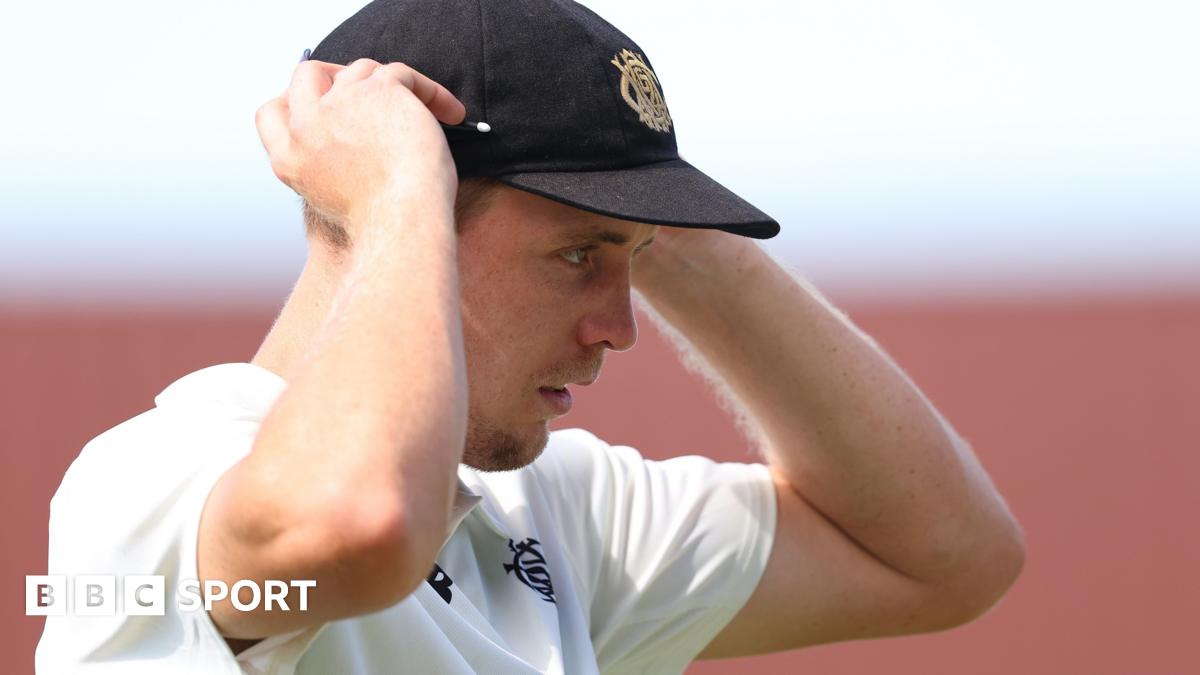 Cameron Green adjusts his cap in the field