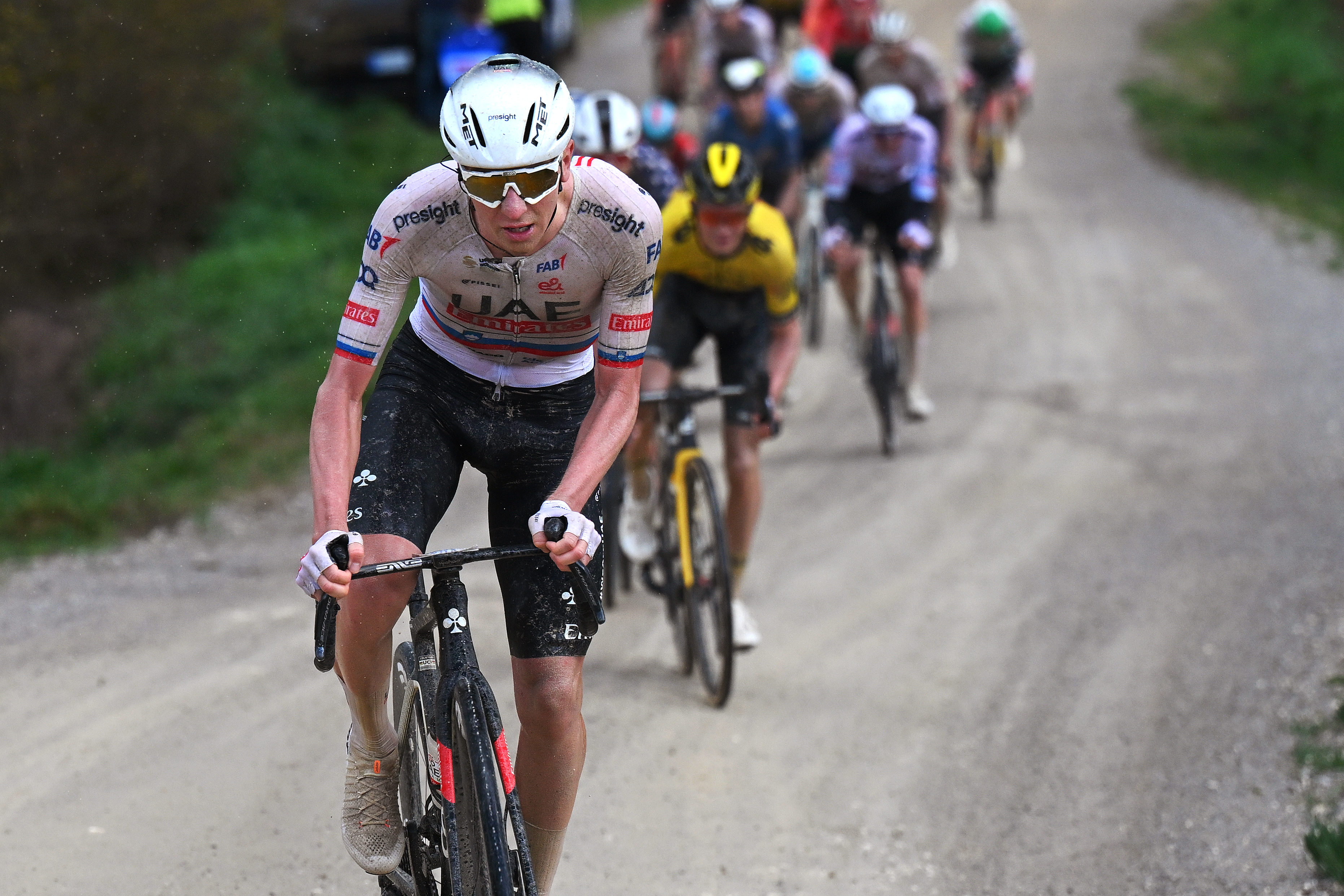 SIENA, ITALY - MARCH 02: Tadej Pogacar of Slovenia and UAE Team Emirates attacks in the breakaway during the 18th Strade Bianche 2024, Men&amp;apos;s Elite a 215km one day race from Siena to Siena 320m / #UCIWT / on March 02, 2024 in Siena, Italy. (Photo by Tim de Waele/Getty Images)