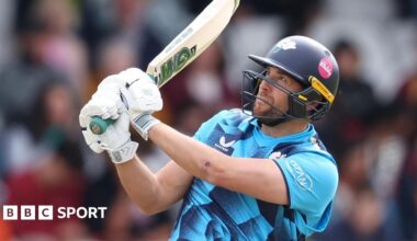Dawid Malan swings his bat and looks to the sky while batting for Yorkshire last season