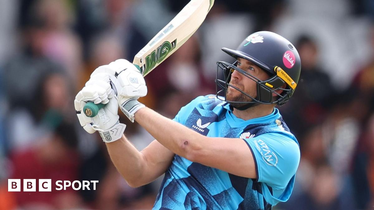 Dawid Malan swings his bat and looks to the sky while batting for Yorkshire last season