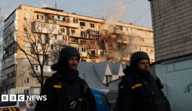 Rescuers work at the site of the apartment buildings hit during the Russian drone strike, amid Russia's attack on Ukraine, in Dnipro, Ukraine November 8, 2025.