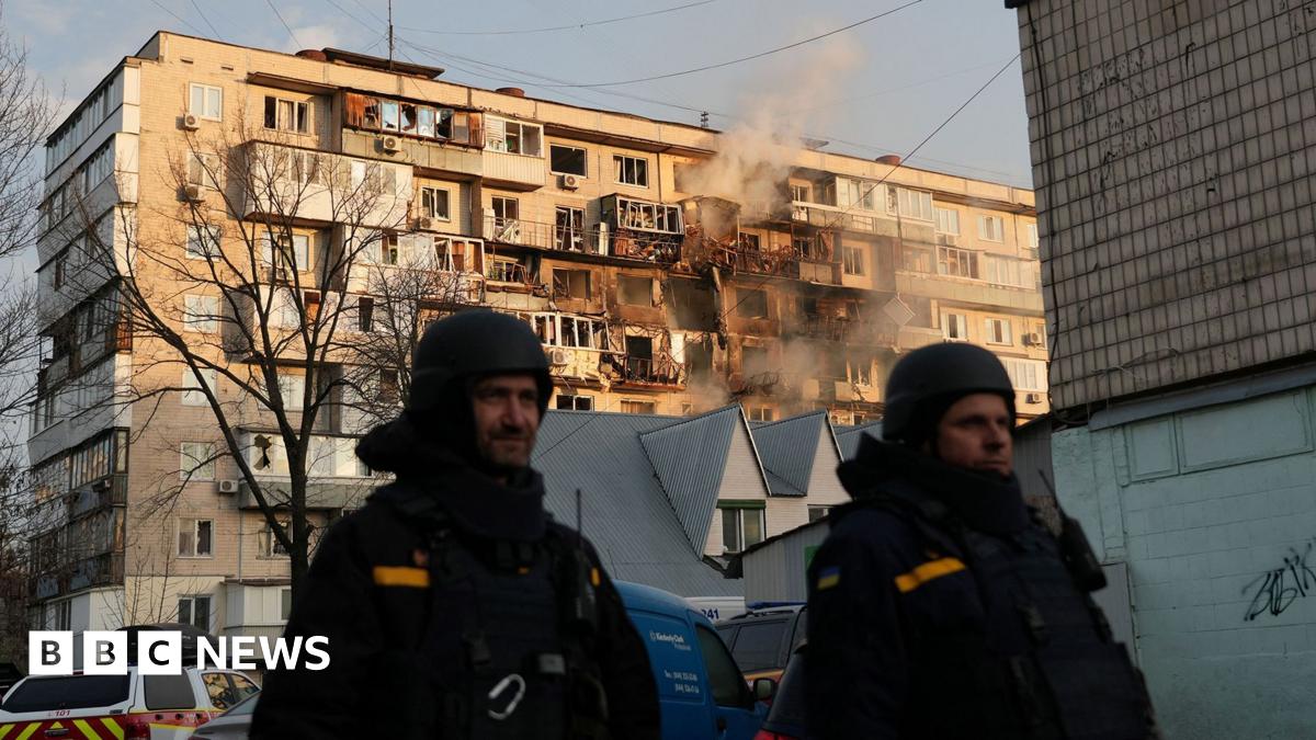 Rescuers work at the site of the apartment buildings hit during the Russian drone strike, amid Russia's attack on Ukraine, in Dnipro, Ukraine November 8, 2025.