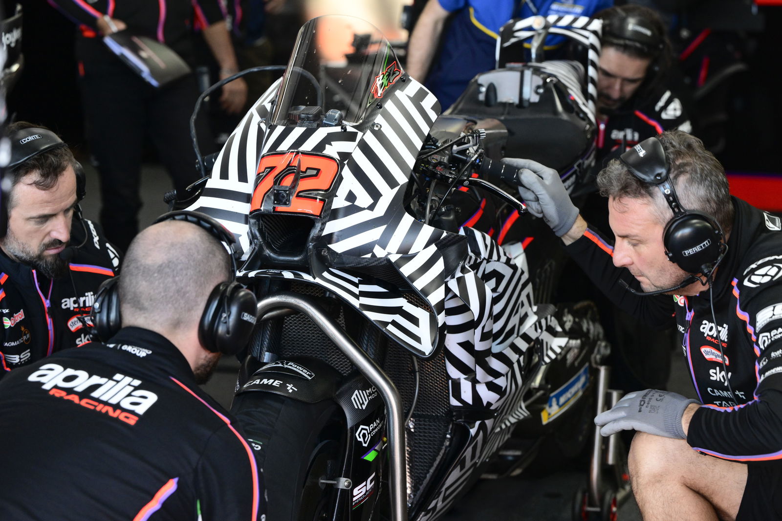 Marco Bezzecchi's Aprilia, 2025 MotoGP Valencia Test, pit box. Credit: Gold and Goose.