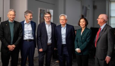 Geoffrey Hinton, Yoshua Bengio, Yann LeCun, Jensen Huang, Fei-Fei Li, and Bill Dally stand together smiling before a panel session.