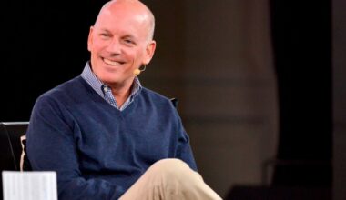 Craig Peters, CEO of Getty Images, smiles while speaking onstage at the 2023 Code Conference.