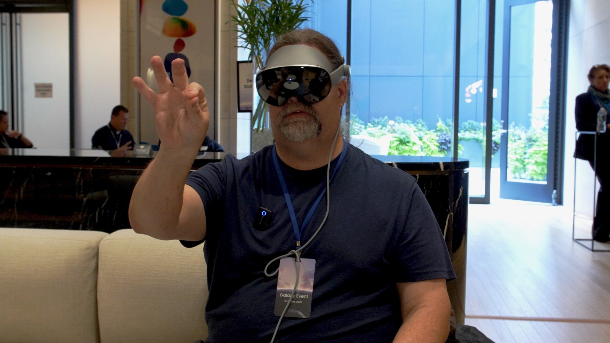 adam doud wearing samsung galaxy xr headset and using hand controls