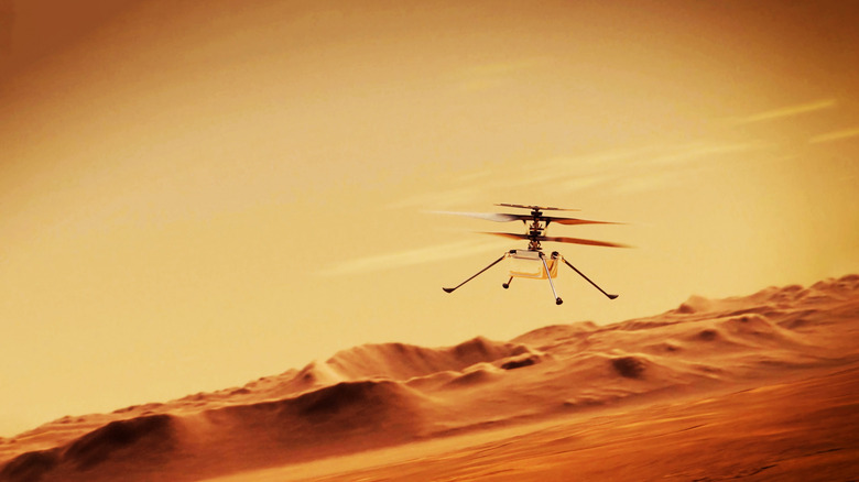 Ingenuity helicopter flying over Martian terrain