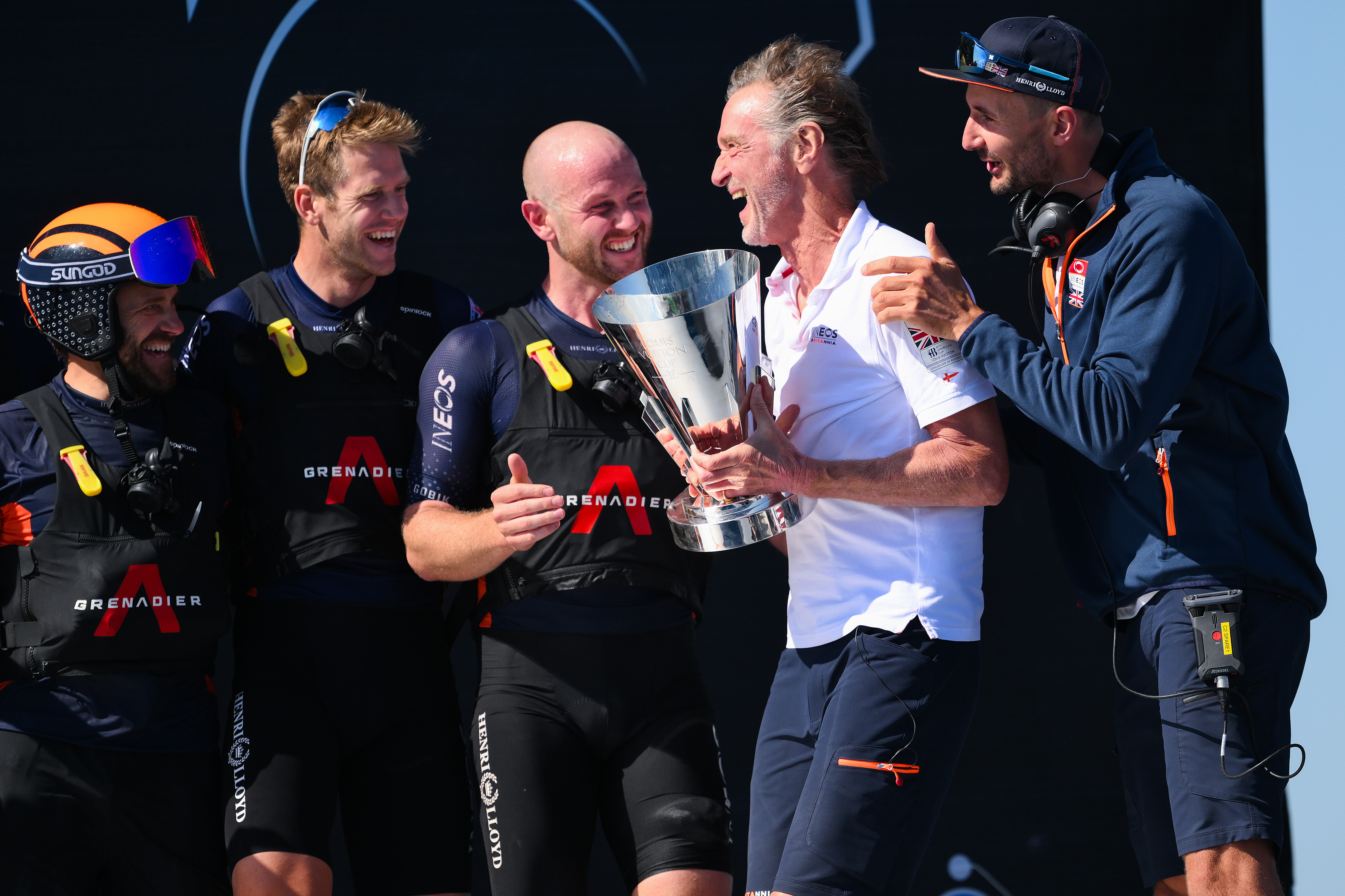 BARCELONA, SPAIN - OCTOBER 04: Ineos CEO Sir Jim Ratcliffe celebrates with the Louis Vuitton Cup after defeating The AC75 Luna Rossa Prada Pirelli Team during the race 11 of the Louis Vuitton Cup Final - 37th America&amp;apos;s Cup on October 04, 2024 in Barcelona, Spain. (Photo by David Ramos/Getty Images)