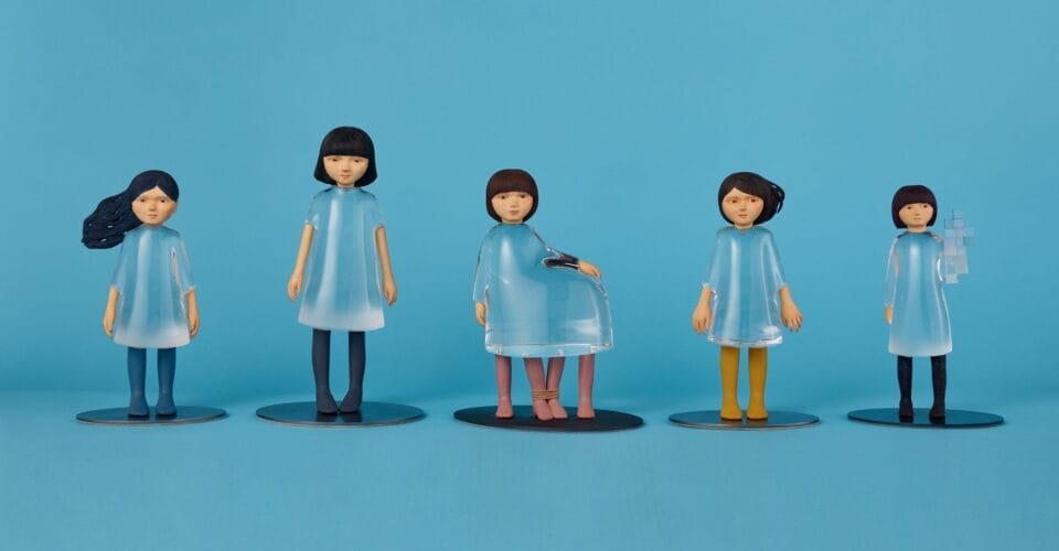 a series of five small sculptures by Ayako Kita made of cypress and acrylic resin, depicting young women or girls in various emotional states