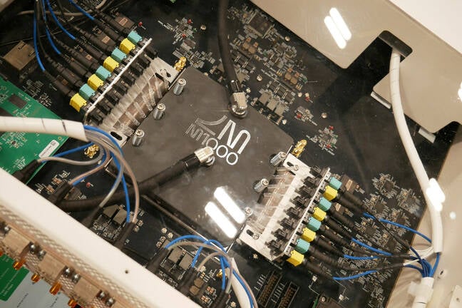 Here Lightmatter demonstrates data moving across its M1000 silicon photonic interposers.