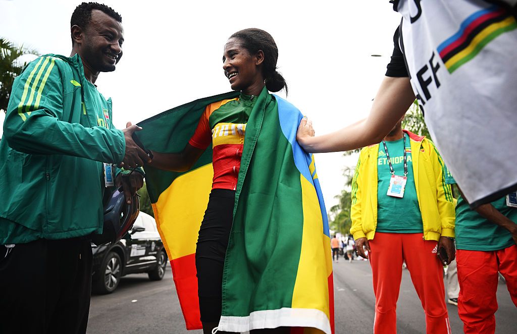 KIGALI, RWANDA - SEPTEMBER 27: Kahsay Tsige Kiros and Team Ethiopia reacts after the 98th UCI Cycling World Championships Kigali 2025 - Women Junior Road Race a 74km race from Kigali to Kigali on September 27, 2025 in Kigali, Rwanda. (Photo by Dario Belingheri/Getty Images)