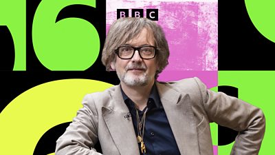 Artwork for Iggy Pop… Jarvis Cocker Sits In. A photo of Jarvis Cocker appears in front of yellow, pink and green branded graphics for BBC Radio 6 Music. 