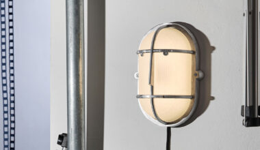 philippe tabet reimagines industrial bulkhead lamp as face-like lighting fixture