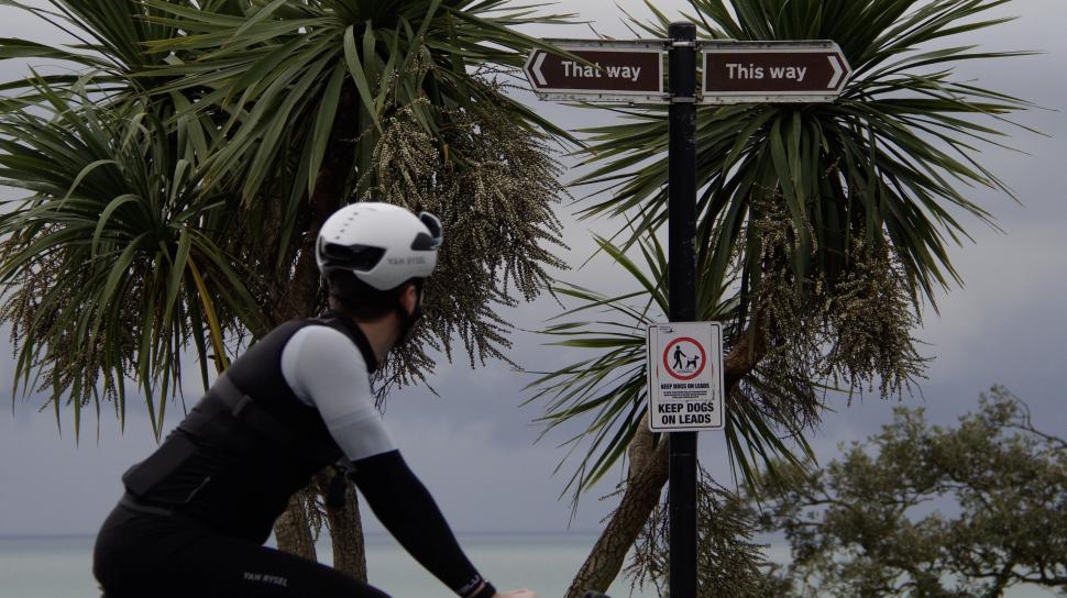 Confusing road signs with cyclist